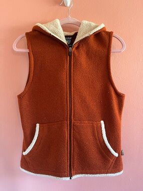 Kuhl Women’s Hooded Sherpa Vest in Rust Orange with Cream Trim